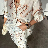 2025 New Women's Temperament Elegant Snake Print Shirt Long Sleeve Open Skirt Loose Set HZ1208